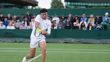 Jul 5, 2023; London, United Kingdom; Ben Shelton (USA) returns a shot against Taro Daniel (JPN) on day three at the All England Lawn Tennis and Croquet Club. Mandatory Credit: Susan Mullane-USA TODAY Sports
