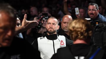 Sep 10, 2016; Cleveland, OH, USA; C.M. Punk (red gloves) before his fight against Mickey Gall (blue gloves) during UFC 203 at Quicken Loans Arena. Mandatory Credit: John David Mercer-USA TODAY Sports