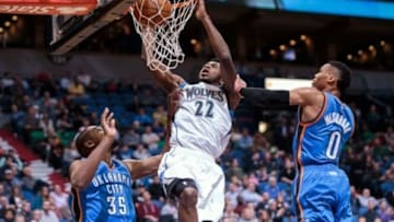 Jan 27, 2016; Minneapolis, MN, USA; Minnesota Timberwolves forward Andrew Wiggins (22) dunks in the third quarter against the Oklahoma City Thunder at Target Center. The Oklahoma City Thunder beat the Minnesota Timberwolves 126-123. Mandatory Credit: Brad Rempel-USA TODAY Sports