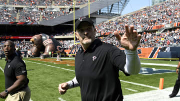 CHICAGO, IL - SEPTEMBER 10: Head coach Dan Quinn of the Atlanta Falcons walks out to the field during the game against the Chicago Bears at Soldier Field on September 10, 2017 in Chicago, Illinois. (Photo by David Banks/Getty Images)