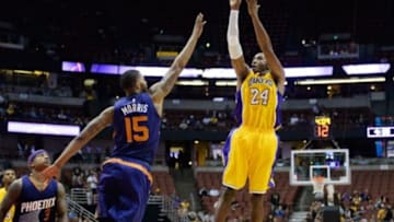 Los Angeles Lakers' guard Kobe Bryant had a bad air ball in their 114-108 overtime loss to the Phoenix Suns but he hit a pair of clutch shots as well as the NBA's preseason winds down Mandatory Credit: Richard Mackson-USA TODAY Sports