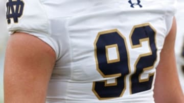 Sep 12, 2015; Charlottesville, VA, USA; Notre Dame Fighting Irish defensive lineman Grant Blankenship (92) participates in warm-ups prior to the Fighting Irish