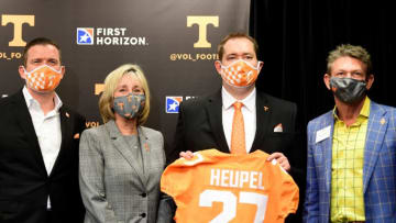 From left University of Tennessee athletic director Danny White, UT chancellor Donde Plowman, University of Tennessee head football coach Josh Heupel, and president of the UT System Randy Boyd, pose for a photo after a press conference announcing Heupel as football head coach, in the Stokely Family Media Center in Neyland Stadium, in Knoxville, Tenn., Wednesday, Jan.27, 2021.Heupel0127 0300