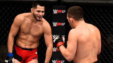 LAS VEGAS, NV - DECEMBER 03: (L-R) Jorge Masvidal taunts Jake Ellenberger in their welterweight bout during The Ultimate Fighter Finale event inside the Pearl concert theater at the Palms Resort
