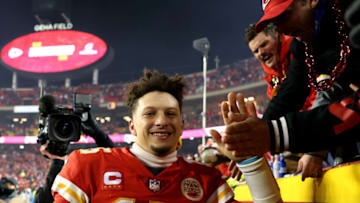 KANSAS CITY, MISSOURI - JANUARY 23: Patrick Mahomes #15 of the Kansas City Chiefs celebrates with fans after defeating the Buffalo Bills in the AFC Divisional Playoff game at Arrowhead Stadium on January 23, 2022 in Kansas City, Missouri. The Kansas City Chiefs defeated the Buffalo Bills with a score of 4 to 36. (Photo by Jamie Squire/Getty Images)