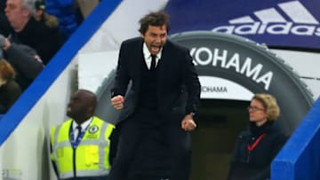 LONDON, ENGLAND - DECEMBER 31: Antonio Conte manager of Chelsea celebrates after Willian of Chelsea scores a goal to make it 2-1 during the Premier League match between Chelsea and Stoke City at Stamford Bridge on December 31, 2016 in London, England. (Photo by Catherine Ivill - AMA/Getty Images)