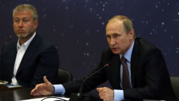 SOCHI, RUSSIA - JULY 19: (RUSSIA OUT) Russian President Vladimir Putin (R) speaks as billionaire and businessman Roman Abramovich (L) looks on during a meeting with top businessmen while visiting the Sirius education center for gifted children on July 19, 2016 in Sochi, Russia. Vladimir Putin said the latest report on doping among Russian athletes lacked substance and was highly political. The Russian president said officials named in the report will be temporarily suspended. (Photo by Mikhail Svetlov/Getty Images)