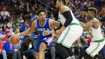 Jan 24, 2016; Philadelphia, PA, USA; Philadelphia 76ers center Jahlil Okafor (8) dribbles against Boston Celtics center Jared Sullinger (7) during the second quarter at Wells Fargo Center. Mandatory Credit: Bill Streicher-USA TODAY Sports