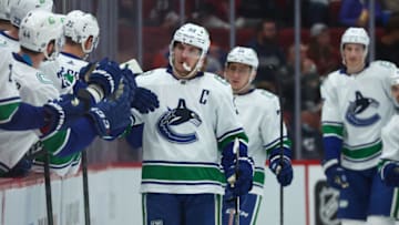 Apr 7, 2022; Glendale, Arizona, USA; Vancouver Canucks center Bo Horvat (53) celebrates his goal scored against the Arizona Coyotes during the second period at Gila River Arena. Mandatory Credit: Mark J. Rebilas-USA TODAY Sports