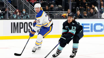 SEATTLE, WASHINGTON - NOVEMBER 04: Brandon Tanev #13 of the Seattle Kraken in action against the Buffalo Sabres on November 04, 2021 at Climate Pledge Arena in Seattle, Washington. (Photo by Steph Chambers/Getty Images)