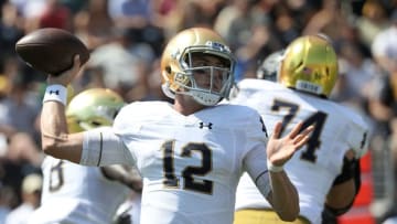 WINSTON SALEM, NC - SEPTEMBER 22: Ian Book #12 of the Notre Dame Fighting Irish drops back to pass against the Wake Forest Demon Deacons during their game at BB&T Field on September 22, 2018 in Winston Salem, North Carolina. (Photo by Streeter Lecka/Getty Images)