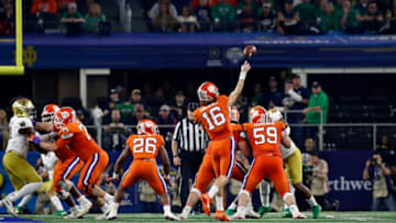 ARLINGTON, TEXAS - DECEMBER 29: Trevor Lawrence #16 of the Clemson Tigers throws a pass for a 19 yard touchdown in the second quarter against the Notre Dame Fighting Irish during the College Football Playoff Semifinal Goodyear Cotton Bowl Classic at AT&T Stadium on December 29, 2018 in Arlington, Texas. (Photo by Tim Warner/Getty Images)
