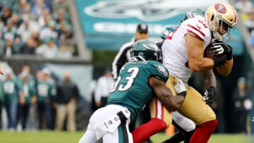 PHILADELPHIA, PA - OCTOBER 29: Garrett Celek #88 of the San Francisco 49ers makes the catch as Nigel Bradham #53 of the Philadelphia Eagles tackles in the first quarter on October 29, 2017 at Lincoln Financial Field in Philadelphia, Pennsylvania. (Photo by Elsa/Getty Images)