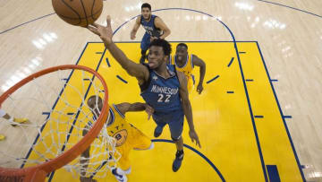 April 5, 2016; Oakland, CA, USA; Minnesota Timberwolves guard Andrew Wiggins (22) shoots the basketball against the Golden State Warriors during the second half at Oracle Arena. The Timberwolves defeated the Warriors 124-117. Mandatory Credit: Kyle Terada-USA TODAY Sports