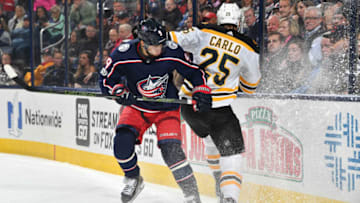 COLUMBUS, OH - OCTOBER 30: Artemi Panarin #9 of the Columbus Blue Jackets collides with Brandon Carlo #25 of the Boston Bruins during the third period of a game on October 30, 2017 at Nationwide Arena in Columbus, Ohio. (Photo by Jamie Sabau/NHLI via Getty Images)
