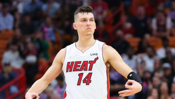 Tyler Herro #14 of the Miami Heat celebrates a three pointer against the Charlotte Hornets (Photo by Michael Reaves/Getty Images)