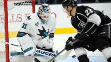 October 7, 2015; Los Angeles, CA, USA; Los Angeles Kings right wing Dustin Brown (23) shoots on goal against San Jose Sharks goalie Martin Jones (31) during the third period at Staples Center. Mandatory Credit: Gary A. Vasquez-USA TODAY Sports