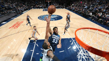 MINNEAPOLIS, MN - JANUARY 18: Karl-Anthony Towns #32 of the Minnesota Timberwolves drives to the basket during the game against LaMarcus Aldridge #12 of the San Antonio Spurs on January 18 2019 at Target Center in Minneapolis, Minnesota. NOTE TO USER: User expressly acknowledges and agrees that, by downloading and or using this Photograph, user is consenting to the terms and conditions of the Getty Images License Agreement. Mandatory Copyright Notice: Copyright 2019 NBAE (Photo by Jordan Johnson/NBAE via Getty Images)