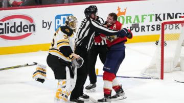 Apr 23, 2023; Sunrise, Florida, USA; Florida Panthers left wing Matthew Tkachuk (19) and Boston Bruins goaltender Linus Ullmark (35) are separated by the linesmen after a line brawl during the third period of game four in the first round of the 2023 Stanley Cup Playoffs at FLA Live Arena. Mandatory Credit: Jasen Vinlove-USA TODAY Sports