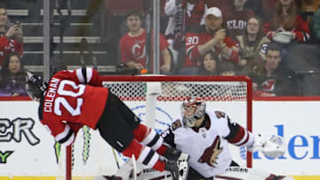 NEWARK, NEW JERSEY - MARCH 23: Blake Coleman #20 of the New Jersey Devils scores in the shoot-out against Darcy Kuemper #35 of the Arizona Coyotes at the Prudential Center on March 23, 2019 in Newark, New Jersey. The Devils defeated the Coyotes 2-1 in the shoot-out. (Photo by Bruce Bennett/Getty Images)
