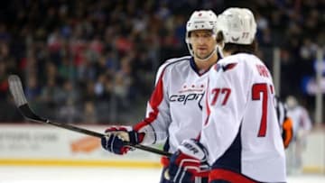 Feb 18, 2016; Brooklyn, NY, USA; Washington Capitals left wing Alex Ovechkin (8) talks to Washington Capitals right wing T.J. Oshie (77) during the first period against the New York Islanders at Barclays Center. Mandatory Credit: Brad Penner-USA TODAY Sports