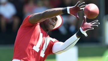 Jul 26, 2014; Atlanta, GA, USA; Atlanta Falcons wide receiver Julio Jones (11) catches a pass during training camp at Falcons Training Complex. Mandatory Credit: Dale Zanine-USA TODAY Sports