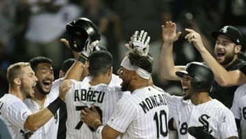 CHICAGO, ILLINOIS - JULY 03: Jose Abreu #79 of the Chicago White Sox celebrates with teammates after hitting a walk-off home run in the 12th inning against the Detroit Tigers during game two of a double header at Guaranteed Rate Field on July 03, 2019 in Chicago, Illinois. (Photo by Quinn Harris/Getty Images)
