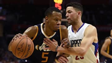 Oct 10, 2016; Los Angeles, CA, USA; Utah Jazz guard Rodney Hood (5) drives the ball defended by Los Angeles Clippers guard Austin Rivers (right) during the third quarter at Staples Center. The Utah Jazz won 96-94. Mandatory Credit: Kelvin Kuo-USA TODAY Sports