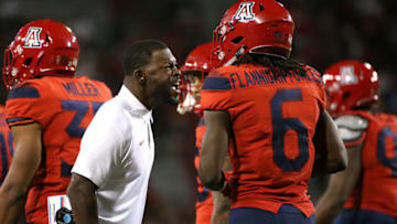 TUCSON, AZ - OCTOBER 14: Assistant coach Jahmile Addae talks with safety Demetrius Flannigan-Fowles #6 of the Arizona Wildcats during the second half of the college football game against the UCLA Bruins at Arizona Stadium on October 14, 2017 in Tucson, Arizona. (Photo by Chris Coduto/Getty Images)