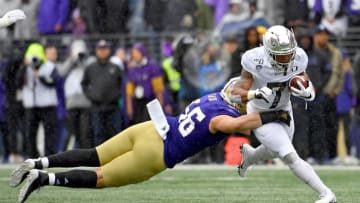 SEATTLE, WASHINGTON - OCTOBER 19: CJ Verdell #7 of the Oregon Ducks catches the ball for a 7 yard gain during the game against the Washington Huskies at Husky Stadium on October 19, 2019 in Seattle, Washington. The Ducks top the Huskies 35-31. (Photo by Alika Jenner/Getty Images)