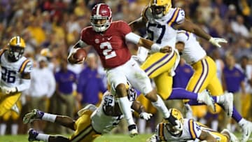 Nov 5, 2016; Baton Rouge, LA, USA; Alabama Crimson Tide quarterback Jalen Hurts (2) carries for a 21 yard touchdown against the LSU Tigers during the fourth quarter at Tiger Stadium. Mandatory Credit: John David Mercer-USA TODAY Sports