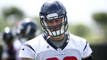 Jun 17, 2014; Houston, TX, USA; Houston Texans defensive end J.J. Watt (99) goes through drills during mini camp at Houston Methodist Training Center. Mandatory Credit: Andrew Richardson-USA TODAY Sports