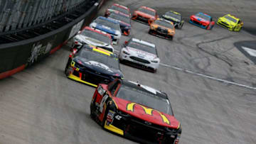 BRISTOL, TN - APRIL 15: Kyle Larson, driver of the #42 McDonald's Chevrolet, leads agroup of cars during the Monster Energy NASCAR Cup Series Food City 500 at Bristol Motor Speedway on April 15, 2018 in Bristol, Tennessee. (Photo by Sean Gardner/Getty Images)