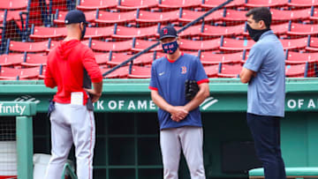 BOSTON, MA - JULY 03: Manager Ron Roenicke talks to Chief Baseball Officer for the Boston Red Sox Chaim Bloom during Summer Workouts at Fenway Park on July 3, 2020 in Boston, Massachusetts. (Photo by Adam Glanzman/Getty Images)