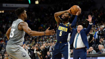 MINNEAPOLIS, MN - APRIL 11: Jimmy Butler #23 of the Minnesota Timberwolves defends against Will Barton #5 of the Denver Nuggets. (Photo by Hannah Foslien/Getty Images)