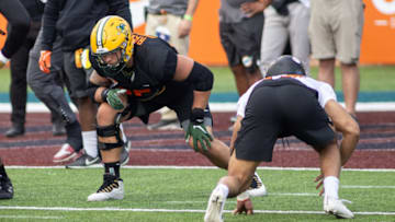 Jan 26, 2021; Mobile, Alabama, USA; National offensive lineman Dillon Radunz of North Dakota State (75) drills during National team practice during the 2021 Senior Bowl week. Mandatory Credit: Vasha Hunt-USA TODAY Sports