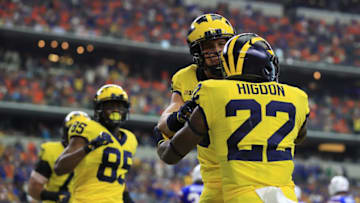 ARLINGTON, TX - SEPTEMBER 02: Zach Gentry #83 of the Michigan Wolverines celebrates the third quarter touchdown by Karan Higdon #22 of the Michigan Wolverines against the Florida Gators at AT&T Stadium on September 2, 2017 in Arlington, Texas. (Photo by Ronald Martinez/Getty Images)