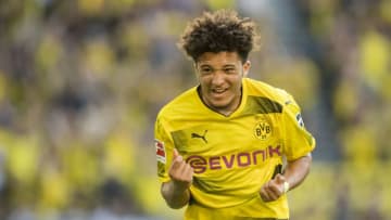 DORTMUND, GERMANY - APRIL 21: Jadon Sancho of Borussia Dortmund cheers after scoring his team's 1st goal during the Bundesliga match between Borussia Dortmund and Bayer 04 Leverkusen at Signal Iduna Park on April 21, 2018 in Dortmund, Germany. (Photo by Alexandre Simoes/Borussia Dortmund/Getty Images)