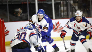 MONCTON, NB - DECEMBER 28: Samuel Honzek # 19 of Team Slovakia Shoots the puck on goaltender Kaidan Mbereko # 30 of Team USA during the first period of their game during the 2023 IIHF World Junior Championship at Avenir Centre on December 28, 2022 in Moncton, Canada. (Photo by Dale Preston/Getty Images)