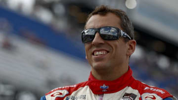 WEST ALLIS, WI - AUGUST 16: Justin Wilson of England, driver of the #19 Dale Coyne Racing Honda, stands on the grid during qualifying for the ABC Supply Wisconsin 250 at The Milwaukee Mile on August 16, 2014 in West Allis, Wisconsin. (Photo by Jeff Zelevansky/Getty Images)