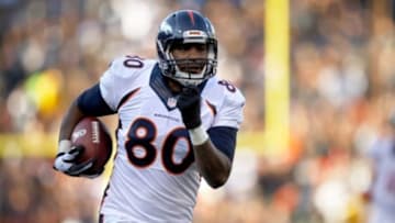 Nov 9, 2014; Oakland, CA, USA; Denver Broncos tight end Julius Thomas (80) catches a touchdown against the Oakland Raiders in the third quarter at O.co Coliseum. The Broncos defeated the Raiders 41-17. Mandatory Credit: Cary Edmondson-USA TODAY Sports