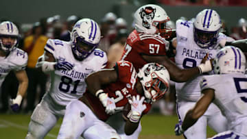 Sep 18, 2021; Raleigh, North Carolina, USA; North Carolina State Wolfpack running back Delbert Mimms III (34) runs the ball during the second half against the Furman Paladins at Carter-Finley Stadium. Mandatory Credit: Rob Kinnan-USA TODAY Sports
