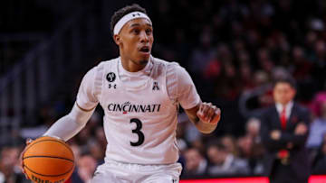 Cincinnati Bearcats guard Mika Adams-Woods dribbles against the Chaminade Silverswords at Fifth Third Arena. USA Today.