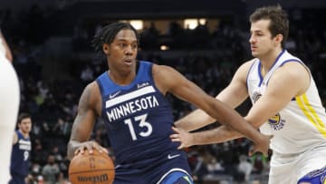 Jan 16, 2022; Minneapolis, Minnesota, USA; Minnesota Timberwolves forward Nathan Knight (13) works around Golden State Warriors forward Nemanja Bjelica (8) in the fourth quarter at Target Center. Mandatory Credit: Bruce Kluckhohn-USA TODAY Sports