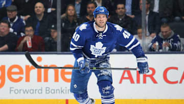 TORONTO, ON - APRIL 1: Troy Bodie #40 of the Toronto Maple Leafs skates against the Calgary Flames during an NHL game at the Air Canada Centre on April 1, 2014 in Toronto, Ontario, Canada. The Leafs defeated the Flames 3-2. (Photo by Claus Andersen/Getty Images)