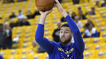 OAKLAND, CA - APRIL 28: Klay Thompson #11 of the Golden State Warriors warms up shooting prior to playing the Houston Rockets in Game One of the Second Round of the 2019 NBA Western Conference Playoffs at ORACLE Arena on April 28, 2019 in Oakland, California. NOTE TO USER: User expressly acknowledges and agrees that, by downloading and or using this photograph, User is consenting to the terms and conditions of the Getty Images License Agreement. (Photo by Thearon W. Henderson/Getty Images)