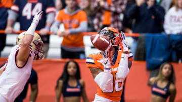 SYRACUSE, NY - NOVEMBER 02: Trishton Jackson #86 of the Syracuse Orange makes a touchdown reception as Nolan Borgersen #5 of the Boston College Eagles defends during the first quarter at the Carrier Dome on November 2, 2019 in Syracuse, New York. (Photo by Brett Carlsen/Getty Images)