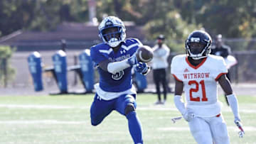 Woodward wide receiver Donte Ferrell (5) attempts to catch a pass in front of Withrow defensive back Terhyon Nichols (21) during their football game Saturday, Oct. 8, 2022.Tigers18