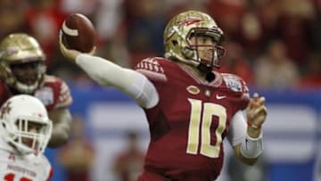 Dec 31, 2015; Atlanta, GA, USA; Florida State Seminoles quarterback Sean Maguire (10) throws the ball against the Houston Cougars in the first quarter in the 2015 Chick-fil-A Peach Bowl at the Georgia Dome. Mandatory Credit: Brett Davis-USA TODAY Sports