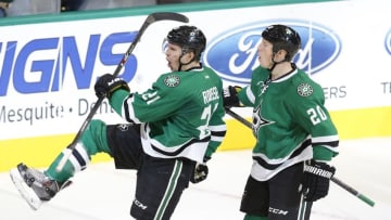 Oct 31, 2014; Dallas, TX, USA; Dallas Stars left wing Antoine Roussel (21) celebrates scoring a goal with center Cody Eakin (20) in the third period against the Anaheim Ducks at American Airlines Center. Anaheim beat Dallas 2-1 in overtime. Mandatory Credit: Tim Heitman-USA TODAY Sports
